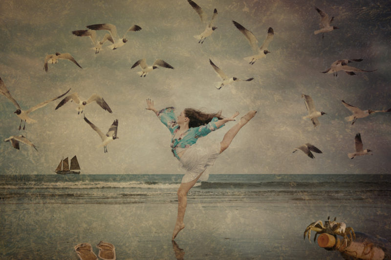 Dancing-On-The-Beach-At-Sunset-By-Michael-Wolfe